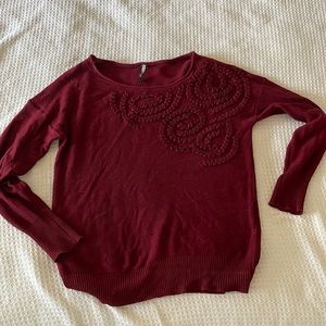 Red scoop neck sweater